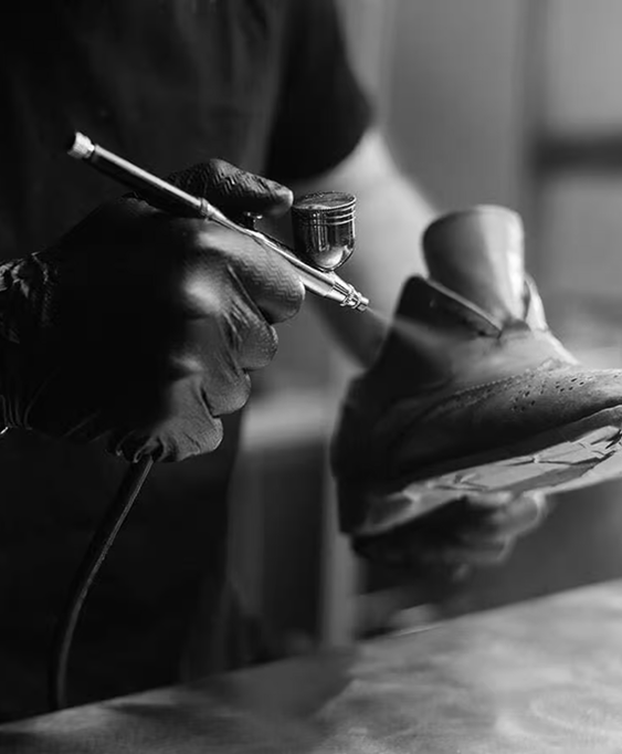 Craftsperson working on leather